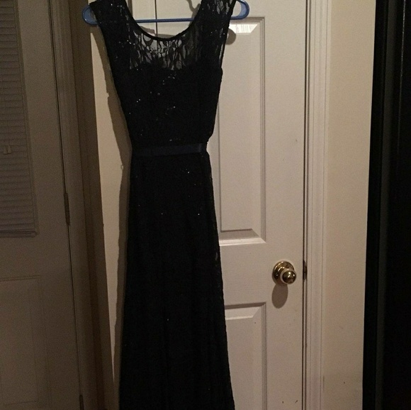 This is a dark navy blue sequined formal dress. - Picture 2 of 4